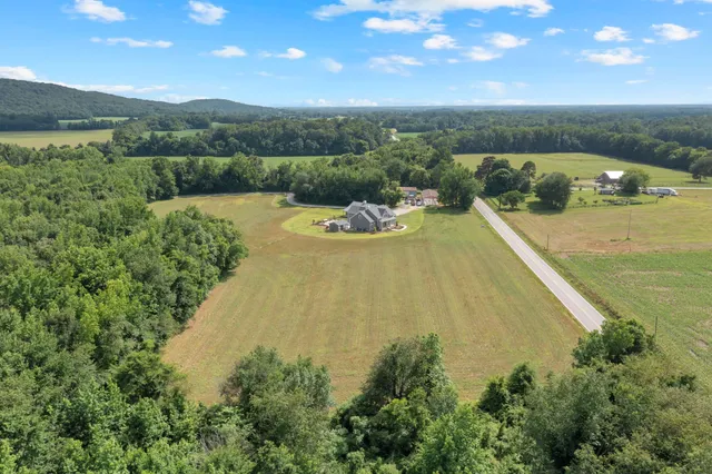 a view of an ocean and a mountain