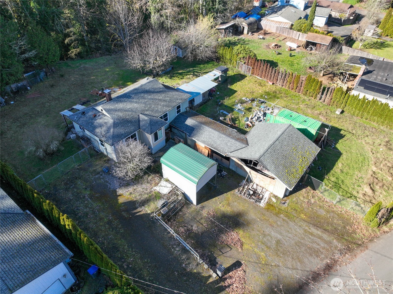 8161 Sandy Road Northeast Bremerton, WA 98311 - Photo 5 of 17 an aerial view of a house with garden space and street view