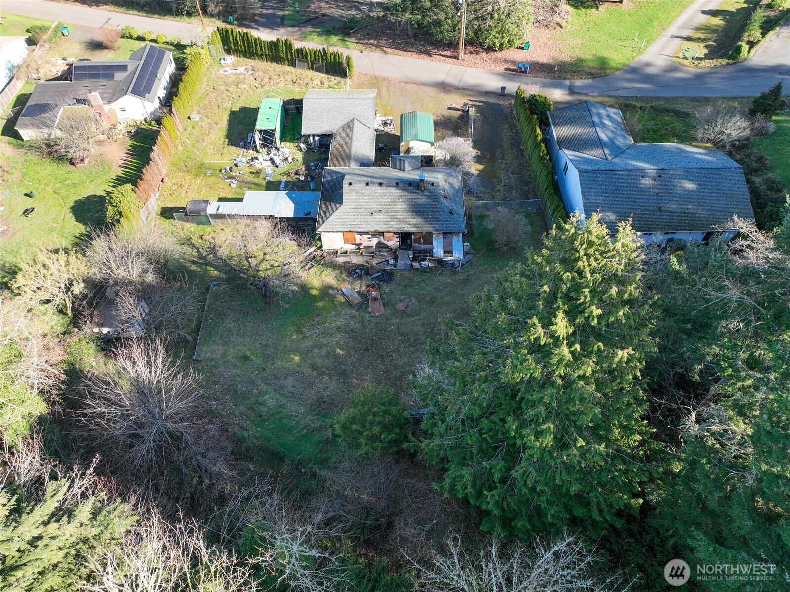 8161 Sandy Road Northeast Bremerton, WA 98311 - Photo 10 of 17 an aerial view of a house with a yard
