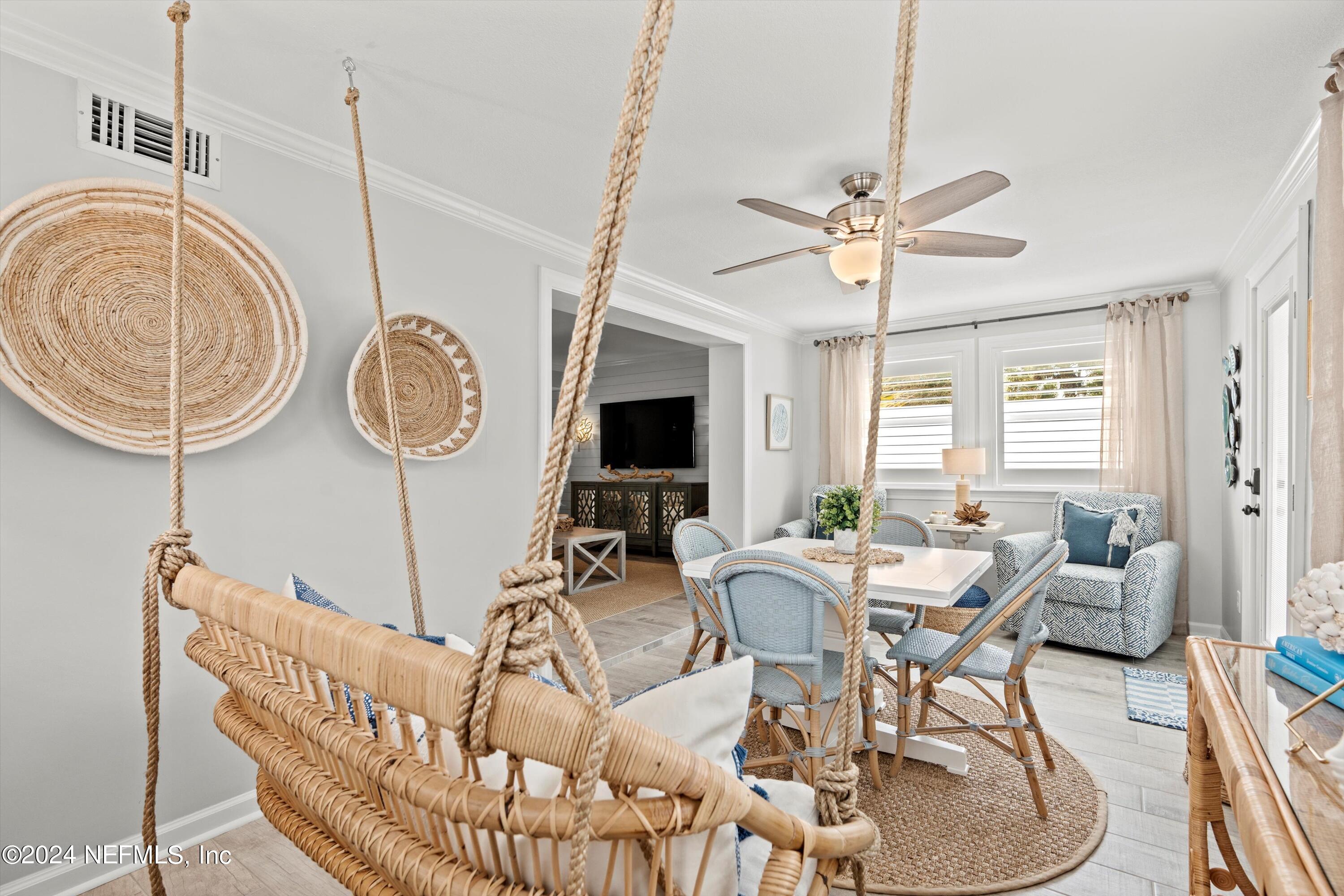 2233 Seminole Road, Unit 31 Atlantic Beach, FL 32233 - Photo 16 of 38 a view of a livingroom with furniture and a chandelier