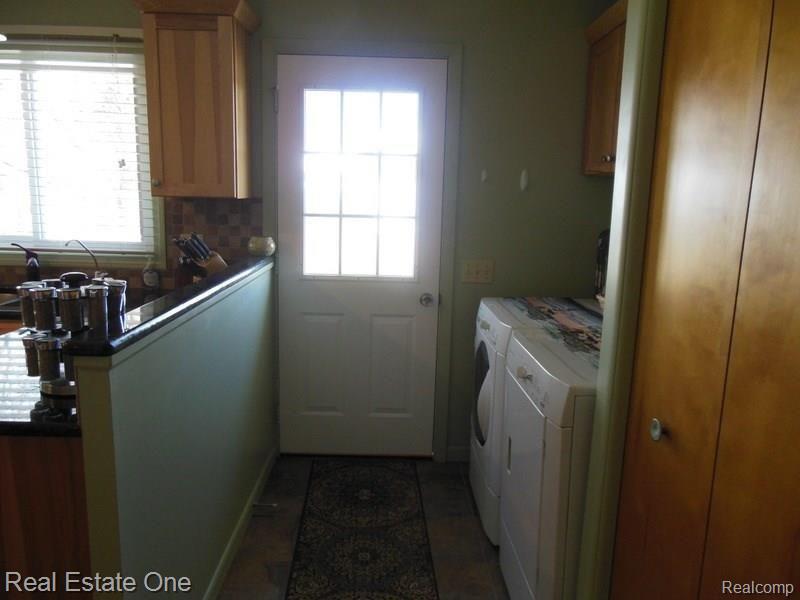 10530 Converse Road Fowlerville, MI 48836 - Photo 15 of 67 1 st floor laundry