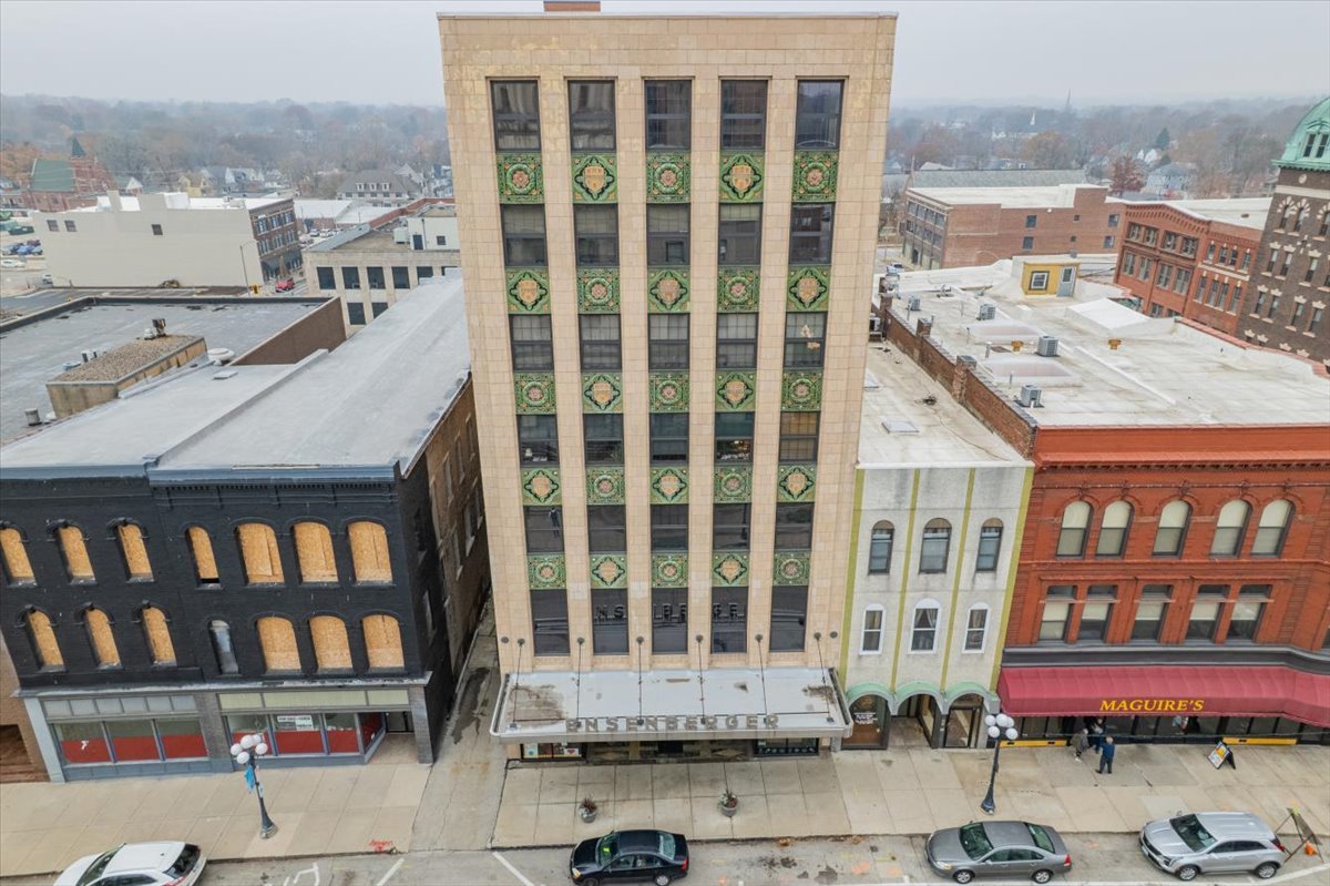 212 North Center Street, Unit 104 Bloomington, IL 61701 - Photo 12 of 22 a city view with tall buildings