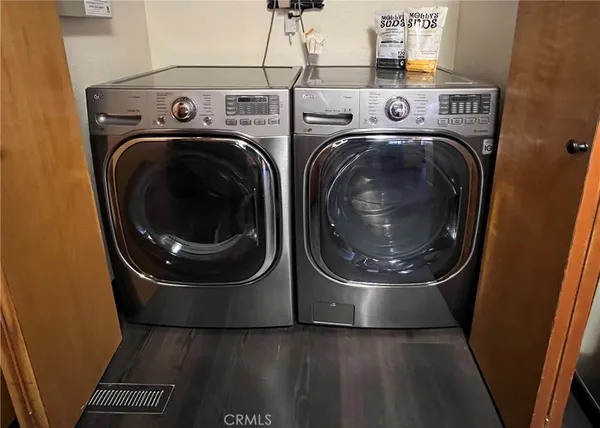 a utility room with dryer and washer