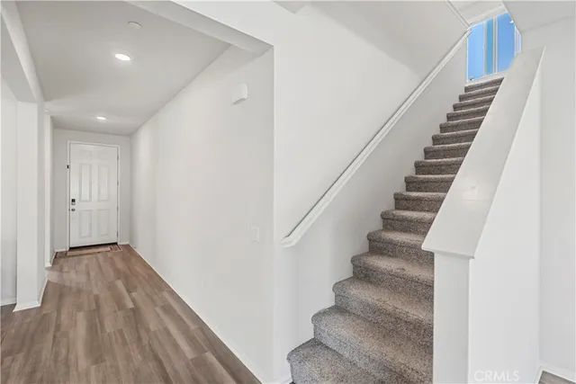 a view of a hallway with white walls