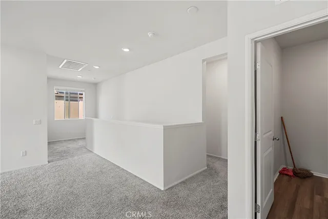 a bathroom with a double vanity sink and mirror