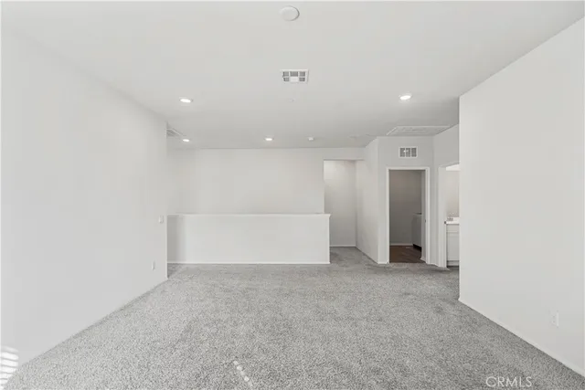 a en suite bathroom with a sink and a mirror