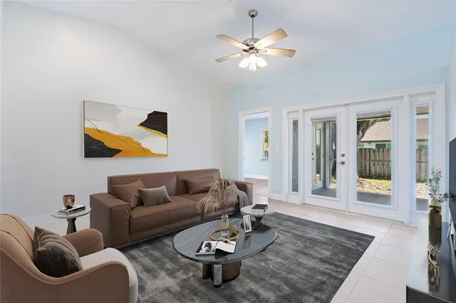 a living room with furniture and a rug