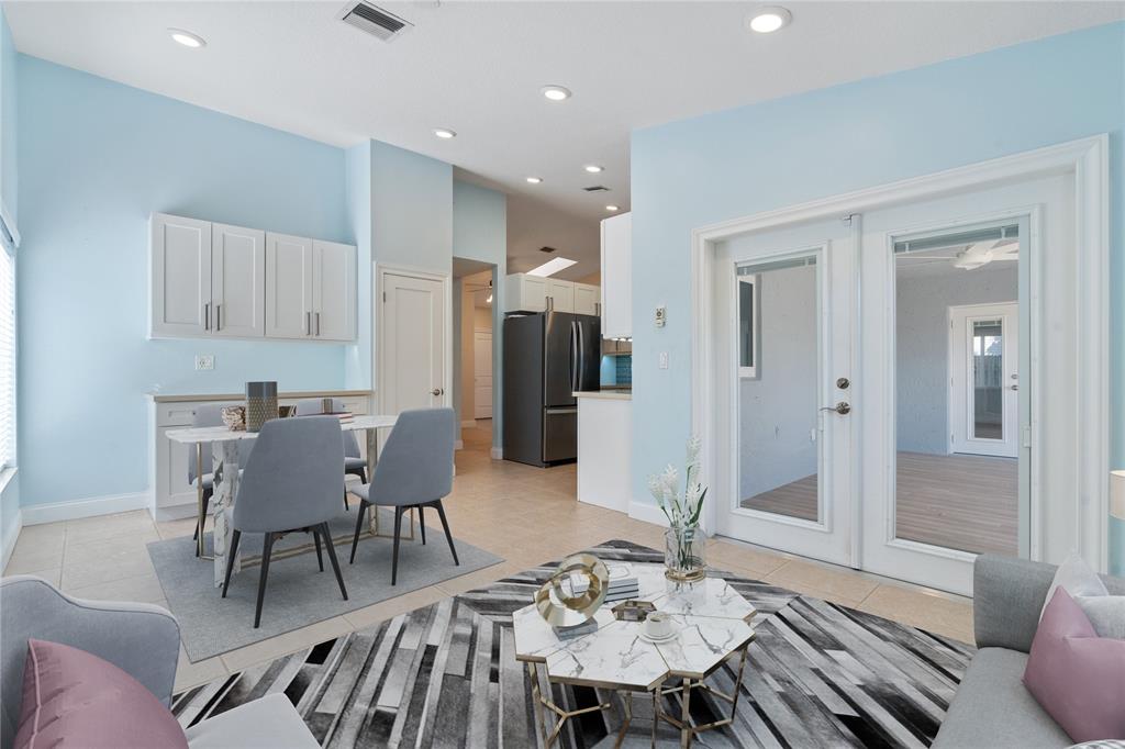 3240 Northwest 106th Avenue Sunrise, FL 33351 - Photo 8 of 21 a view of a dining room with furniture