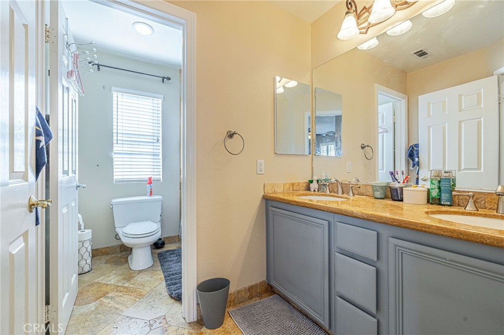 24345 Caladium Place Valencia, CA 91354 - Photo 27 of 59 Shared Bathroom w/ dual sinks