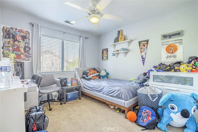 a view of a patio with a dining table and chairs