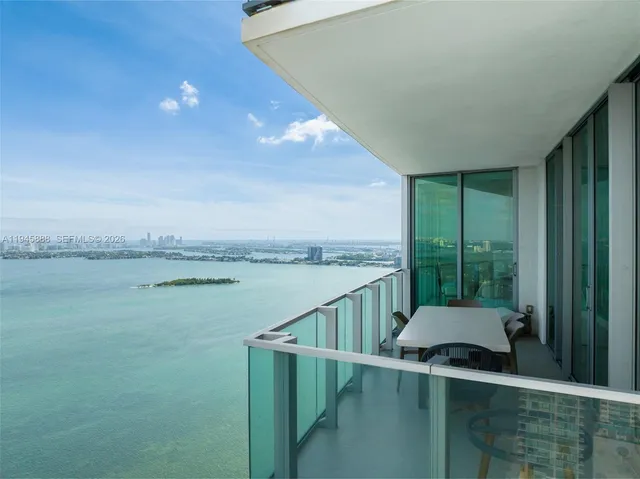 a view of a city with an ocean