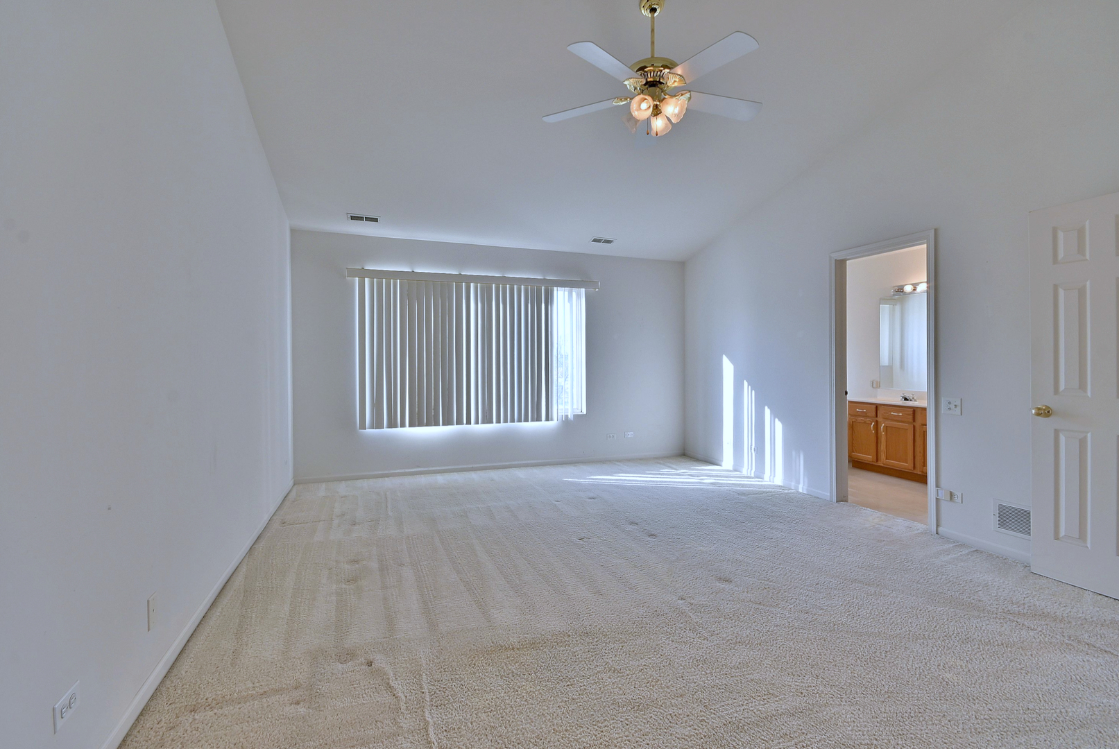 1202 Delta Drive Elgin, IL 60123 - Photo 14 of 23 a view of an empty room with a window