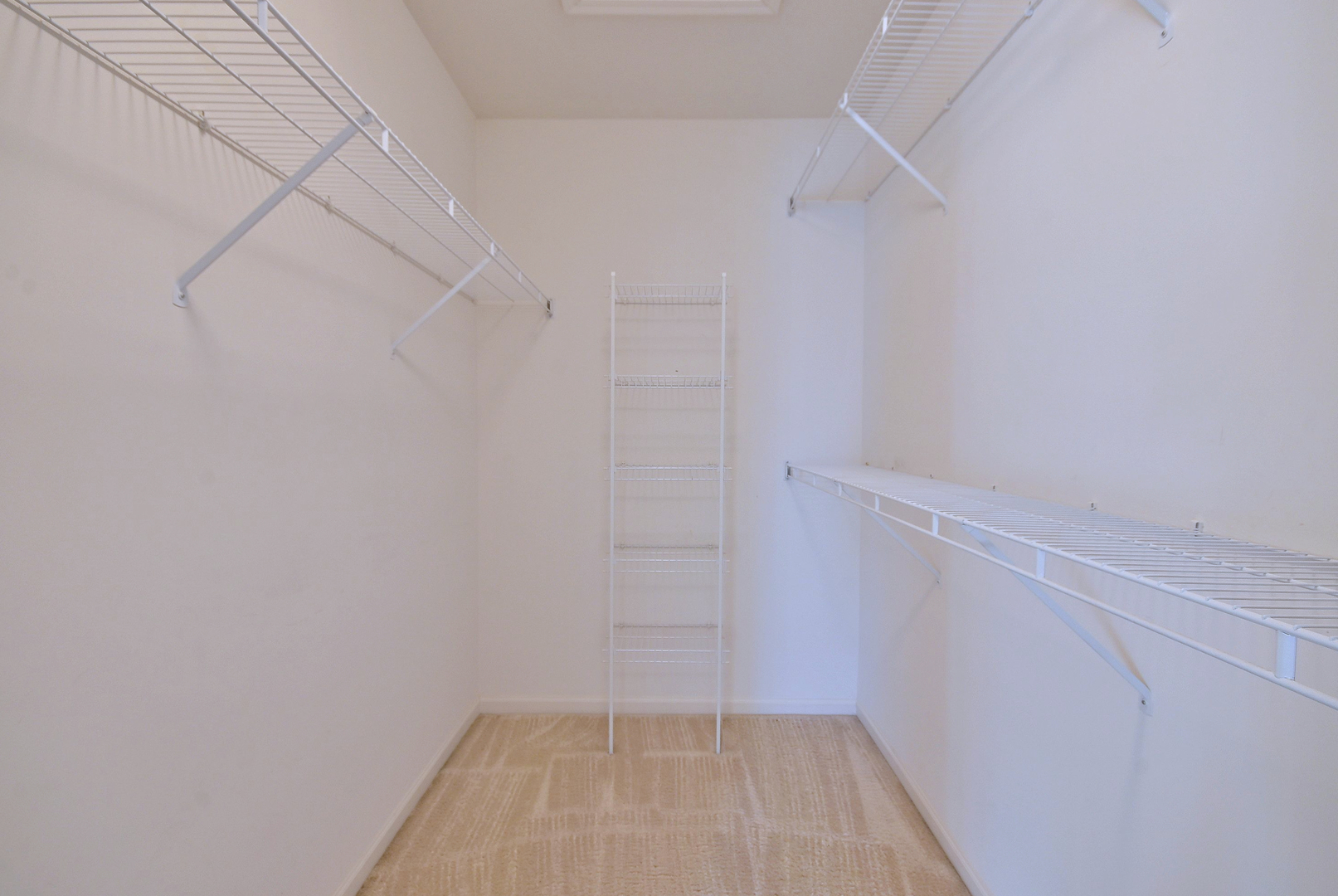 1202 Delta Drive Elgin, IL 60123 - Photo 16 of 23 a view of a room with racks on the wall
