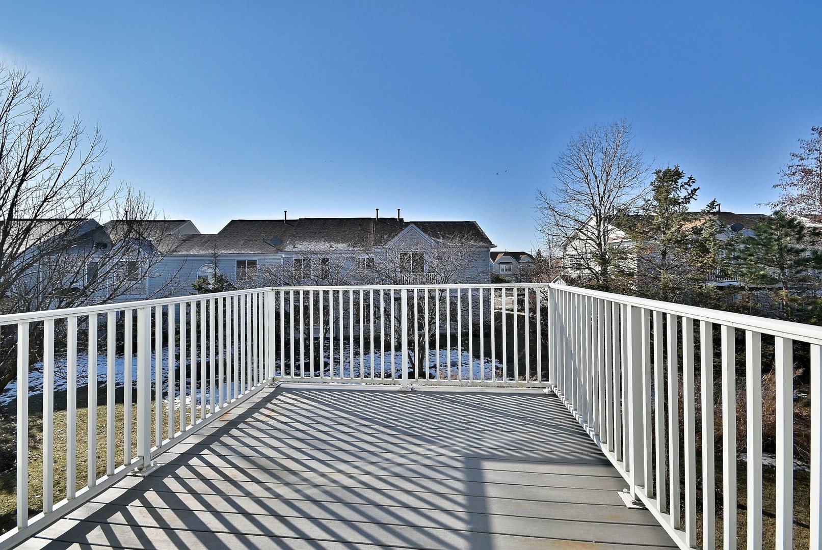 1202 Delta Drive Elgin, IL 60123 - Photo 6 of 23 a balcony with wooden floor in view