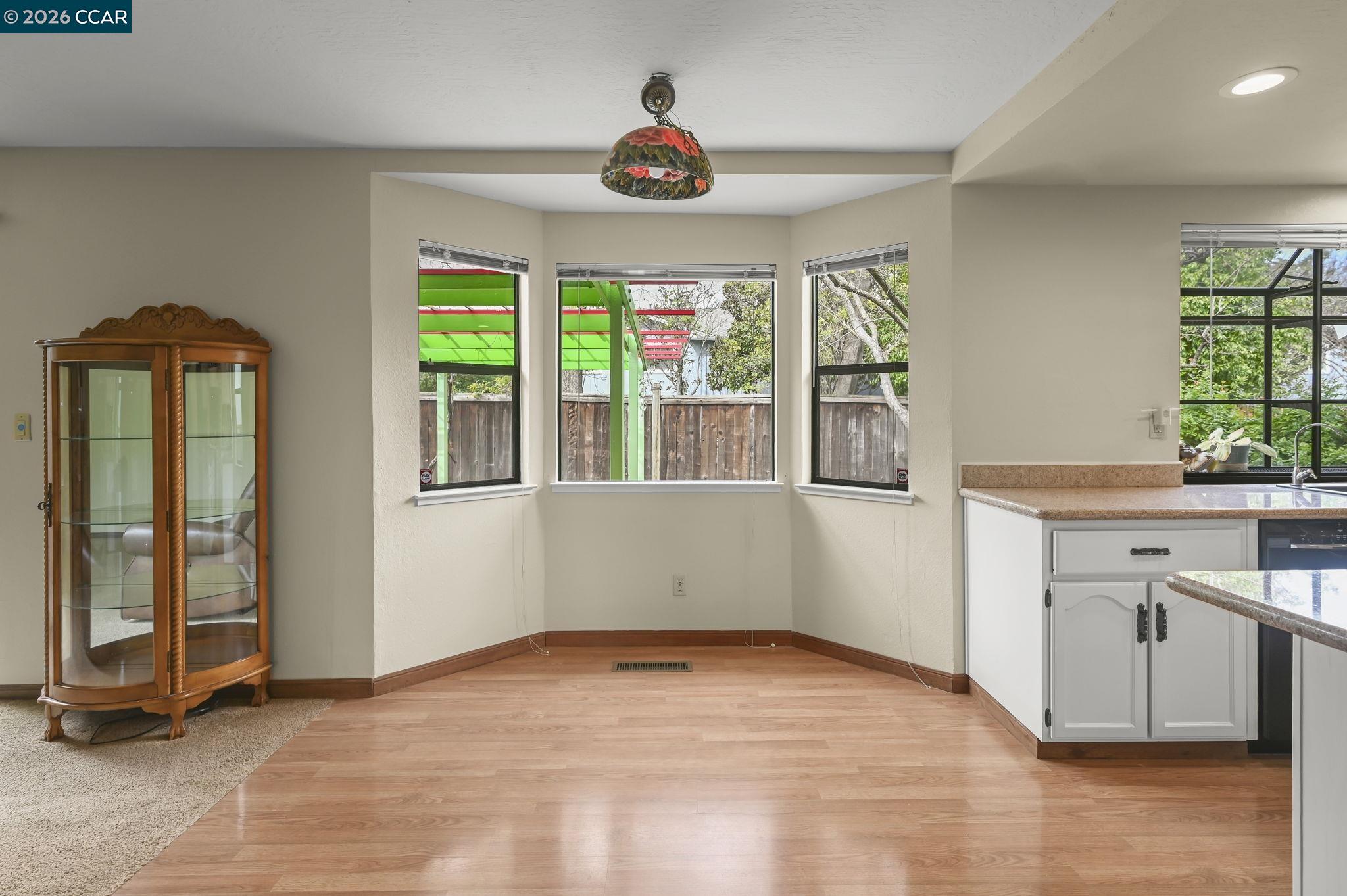 5017 Murchio Drive Concord, CA 94521 - Photo 13 of 30 a view of an empty room with a window