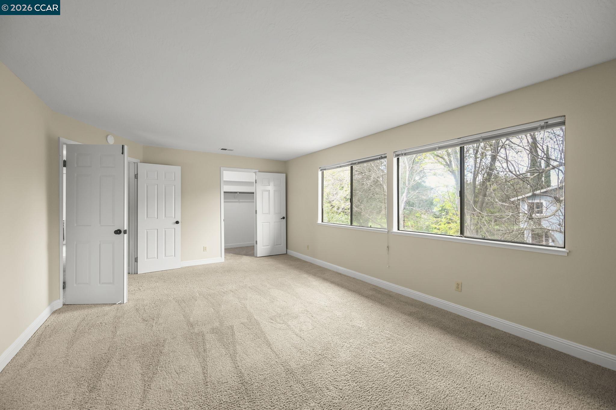 5017 Murchio Drive Concord, CA 94521 - Photo 18 of 30 a view of an empty room with a window