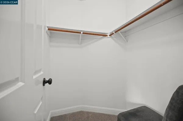 a view of small space with racks on the wall