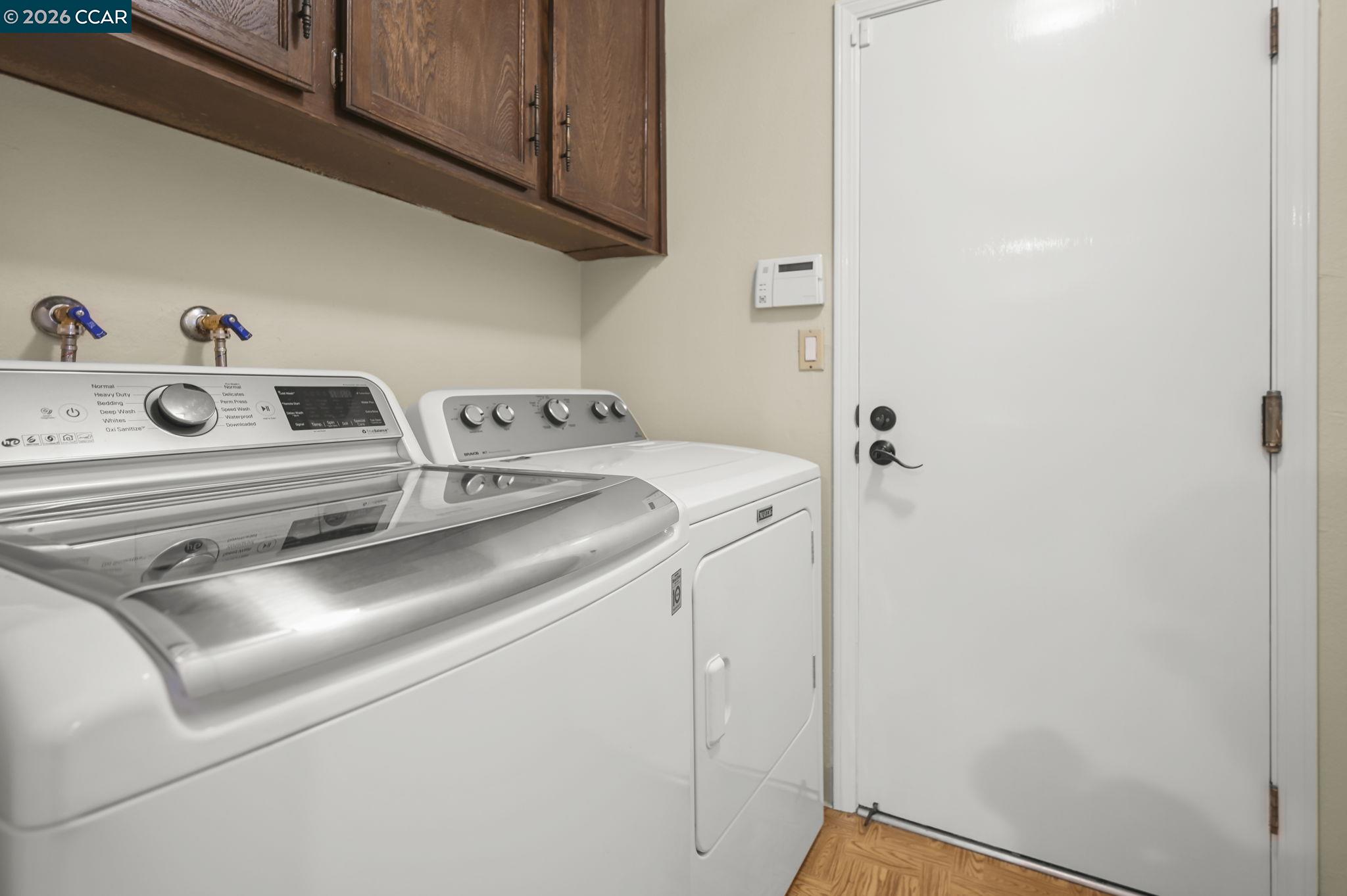 5017 Murchio Drive Concord, CA 94521 - Photo 26 of 30 a utility room with dryer and washer