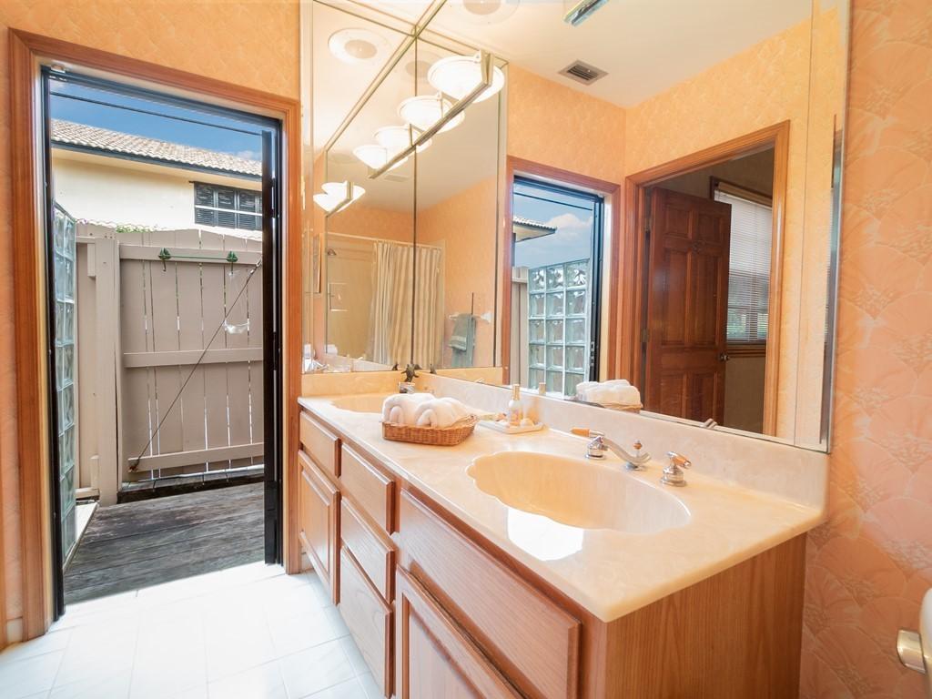 27 Sailfish Lane Ocean Ridge, FL 33435 - Photo 18 of 40 018_Master Bathroom Cabana Exit