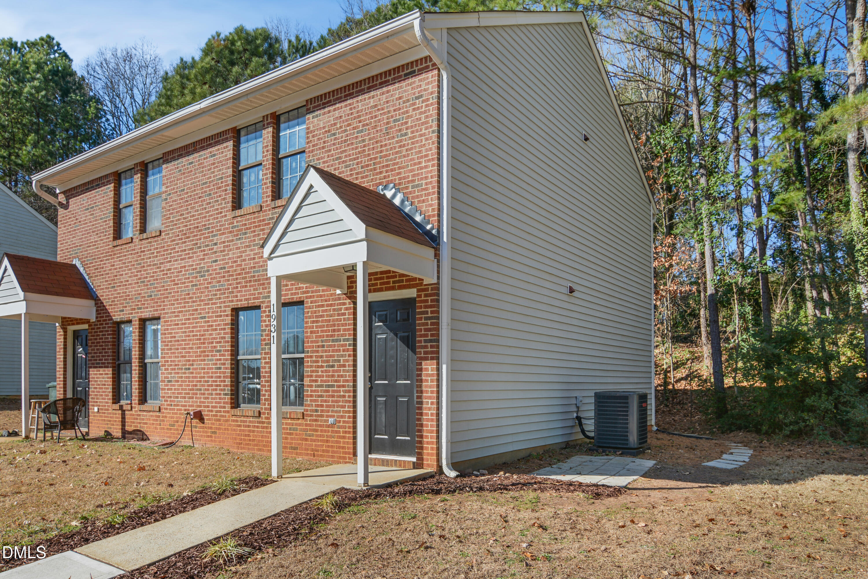 1931 Tischer Road Raleigh, NC 27603 - Photo 2 of 19 a front view of a house with a yard