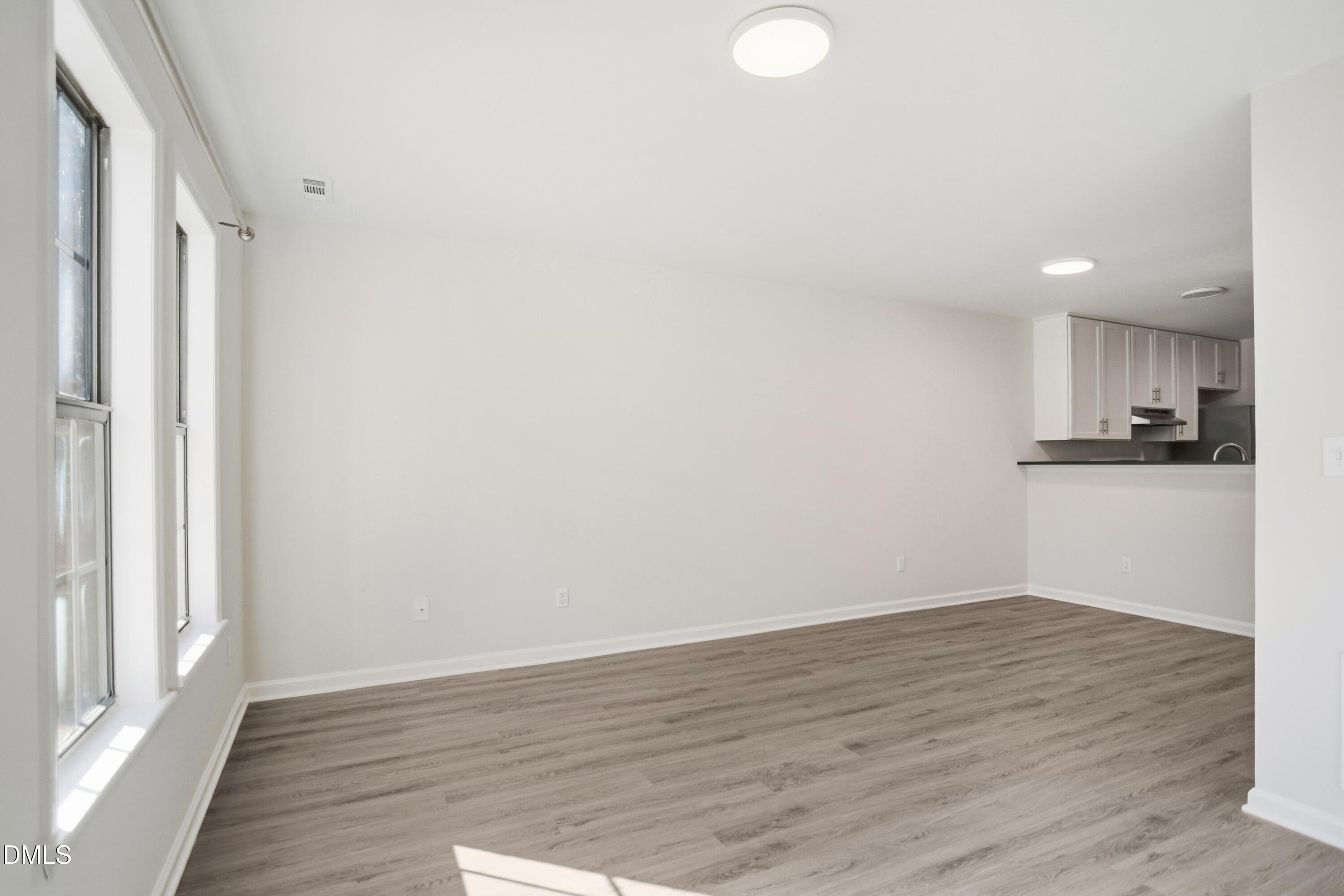 1931 Tischer Road Raleigh, NC 27603 - Photo 4 of 19 a view of kitchen with wooden floor
