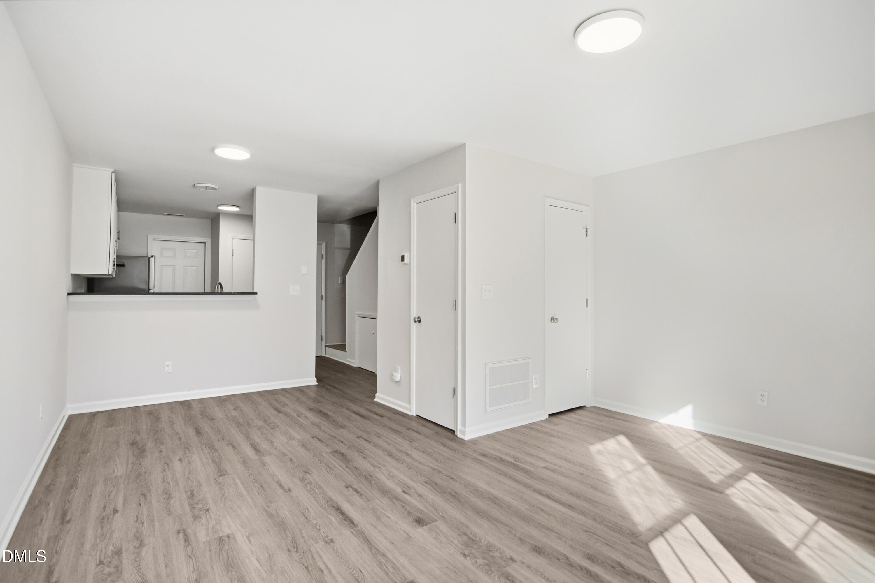 1931 Tischer Road Raleigh, NC 27603 - Photo 6 of 19 a view of a kitchen with wooden floor and a sink