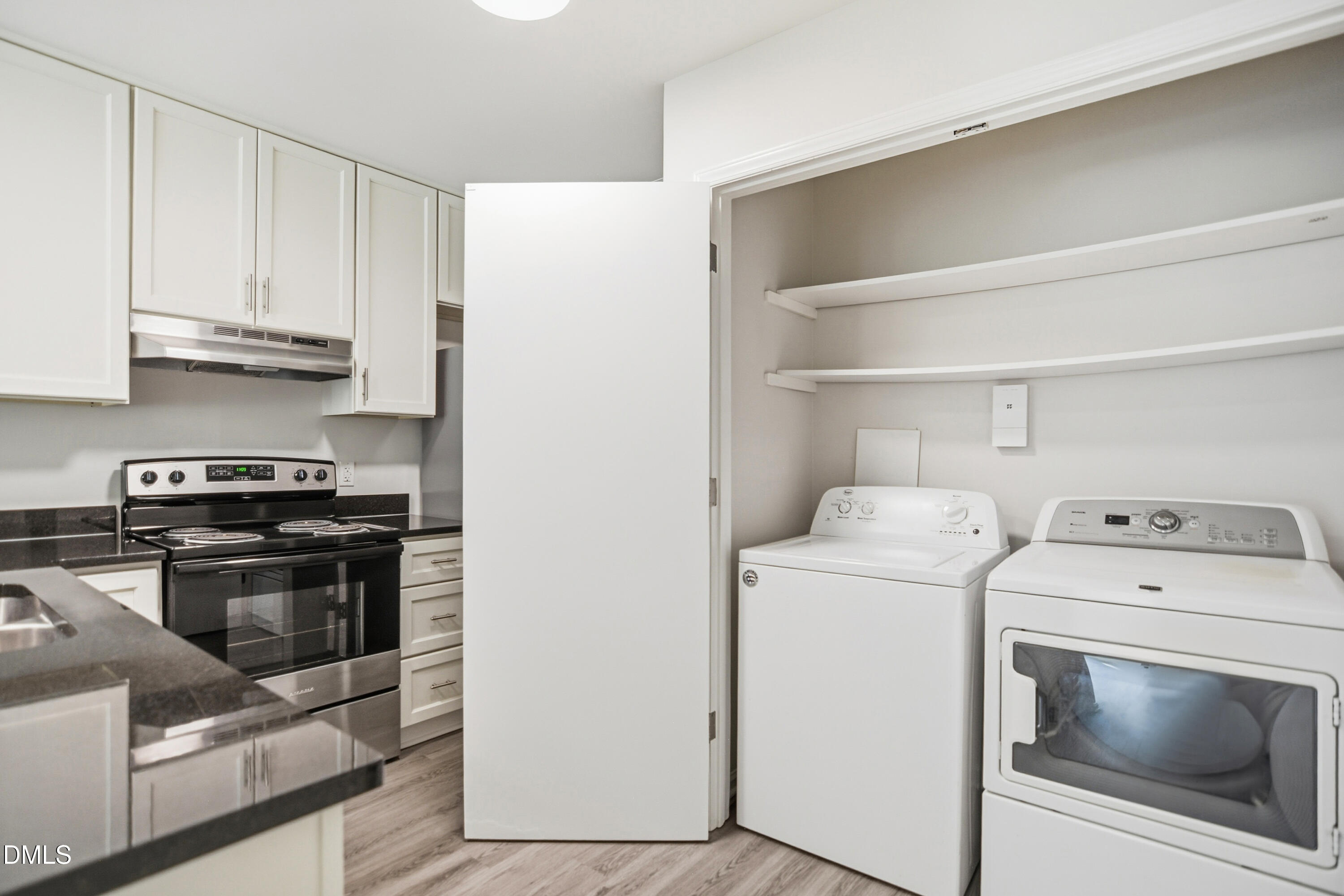1931 Tischer Road Raleigh, NC 27603 - Photo 8 of 19 a utility room with dryer and washer
