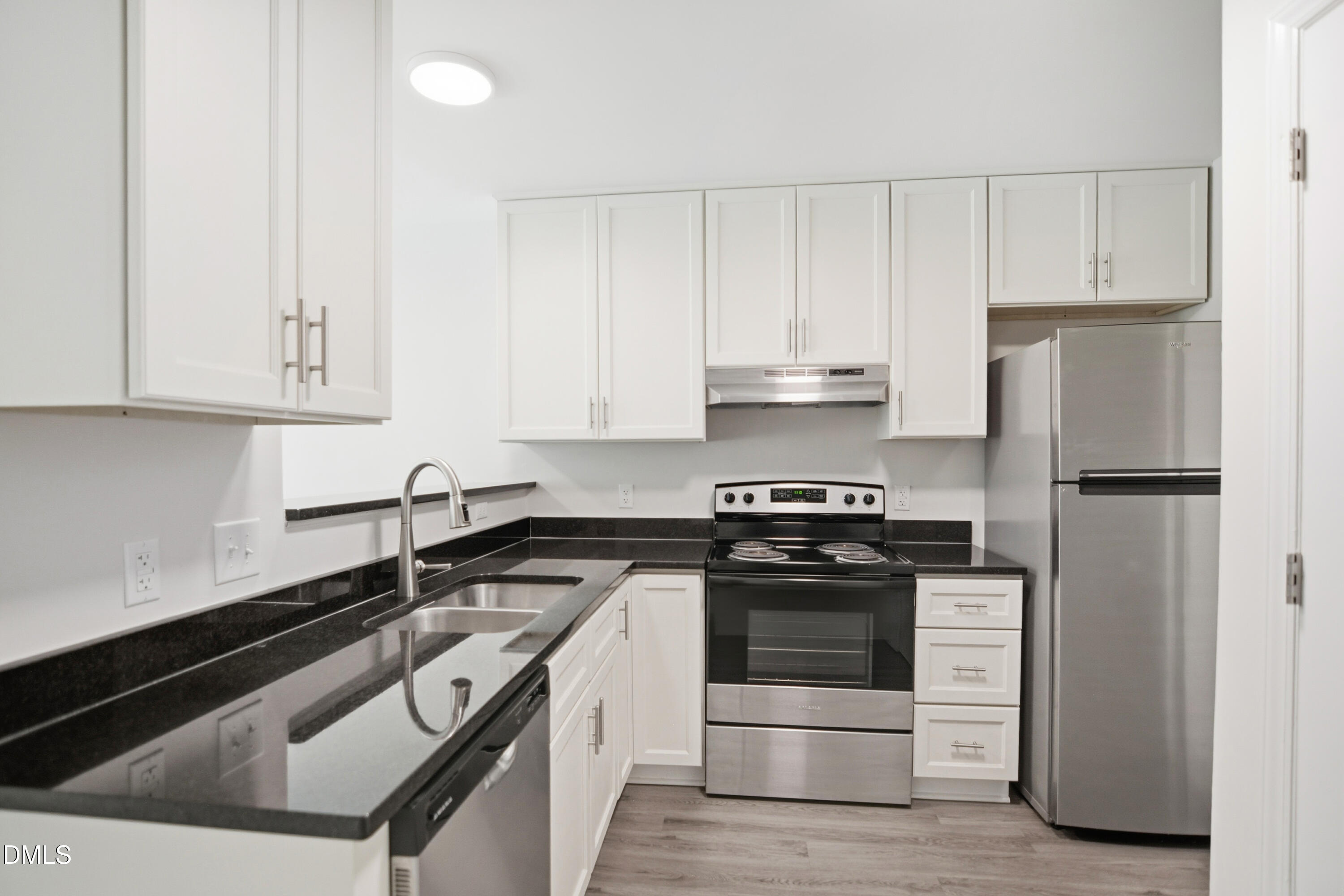 1931 Tischer Road Raleigh, NC 27603 - Photo 9 of 19 a kitchen with a sink stove and refrigerator