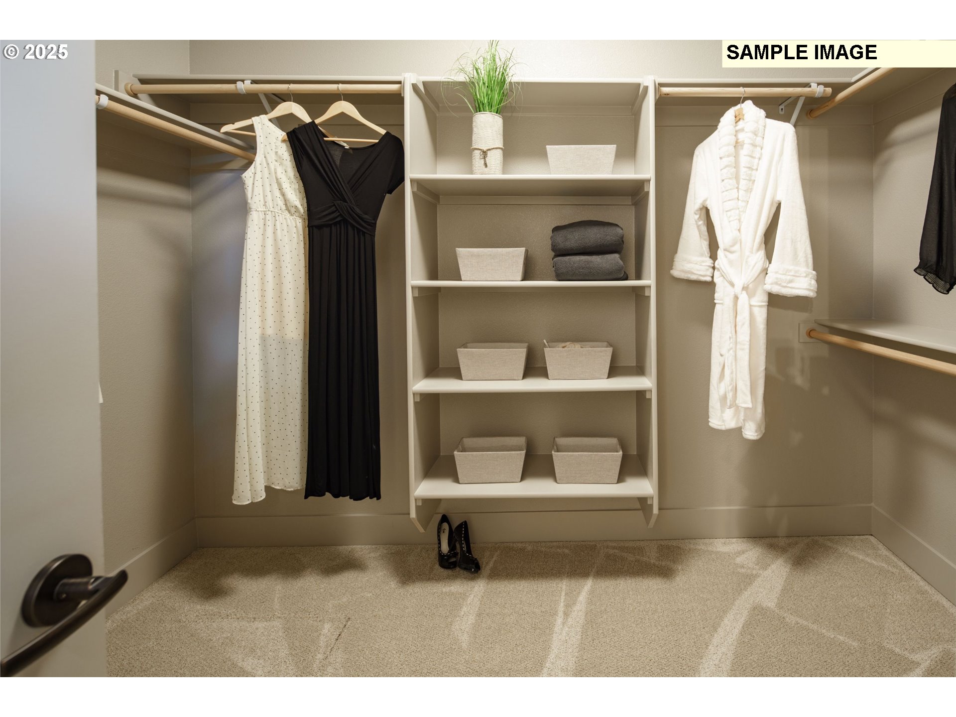 2064 South River Road Kelso, WA 98626 - Photo 10 of 18 a view of walk in closet with clothes and shoes