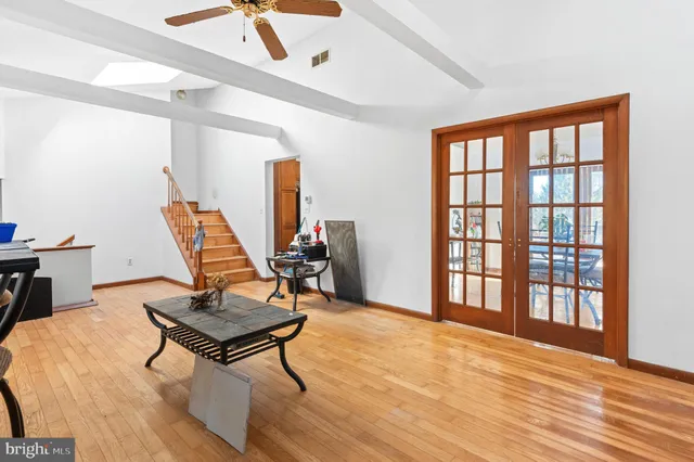 a kitchen with a stove a microwave and a sink