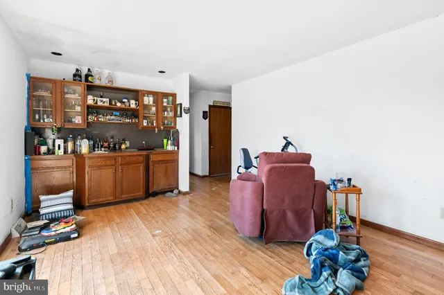 a view of a room with wooden walls