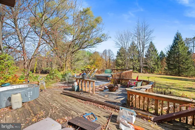 a view of a swimming pool with a deck
