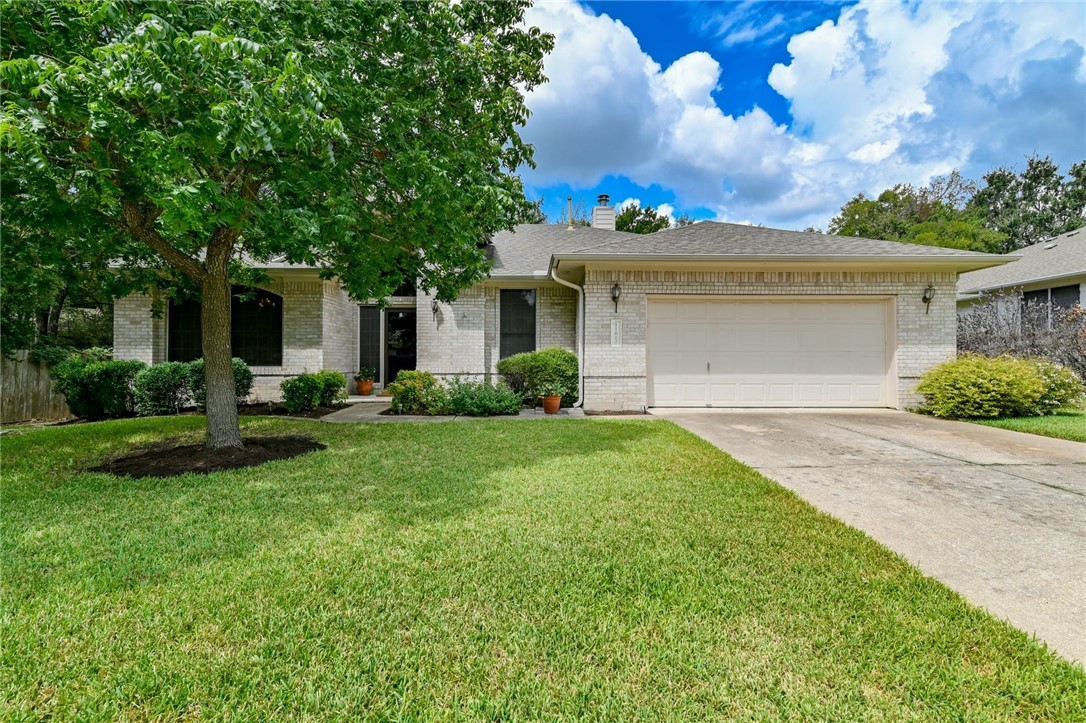 11610 Swan Drive Austin, TX 78750 - Photo 1 of 1 a front view of house with yard and green space