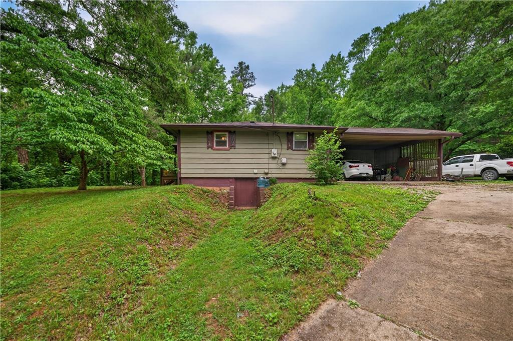 4399 Highway 411 Rydal, GA 30171 - Photo 22 of 37 a front view of house with yard and green space