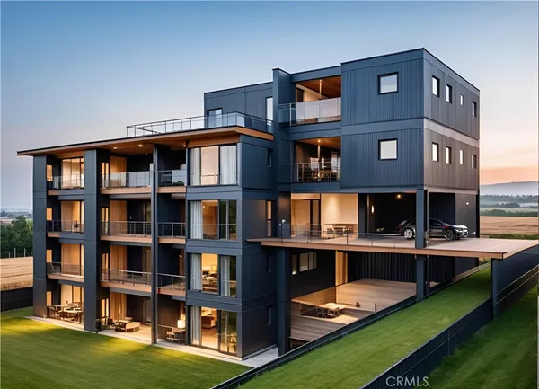 a front view of a house with a yard table and chairs
