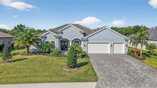 front view of a house with a yard
