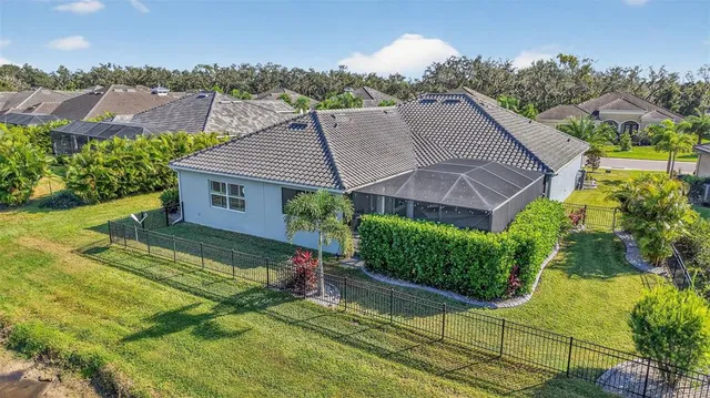 a view of a livingroom with furniture and a bookshelf