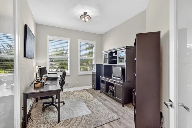 a kitchen with stainless steel appliances a refrigerator sink and cabinets