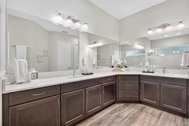 a view of a patio with a table and chairs