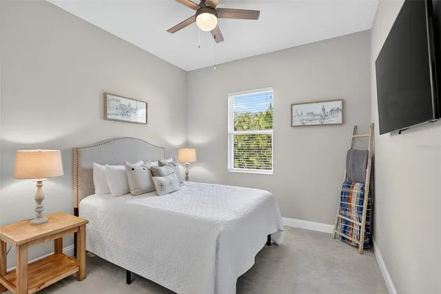 an aerial view of residential houses and outdoor space
