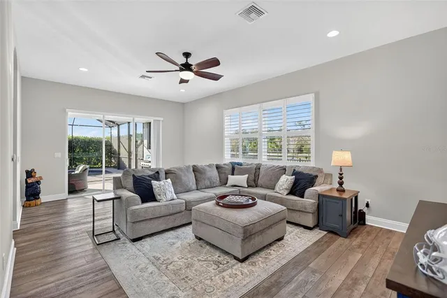 an aerial view of a house with swimming pool