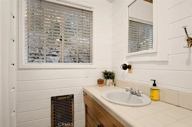 a bathroom with a shower and a toilet