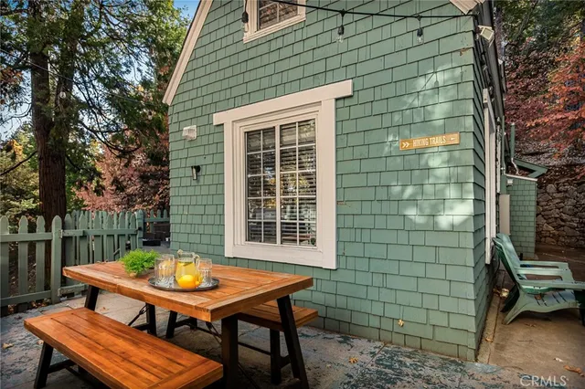 a kitchen with stainless steel appliances a refrigerator and a stove top oven