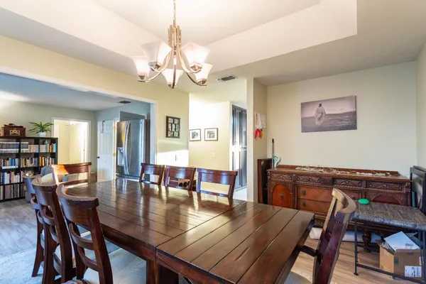 a view of a dining room with furniture window and outside view