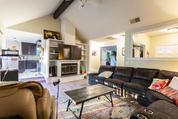 a view of balcony with furniture