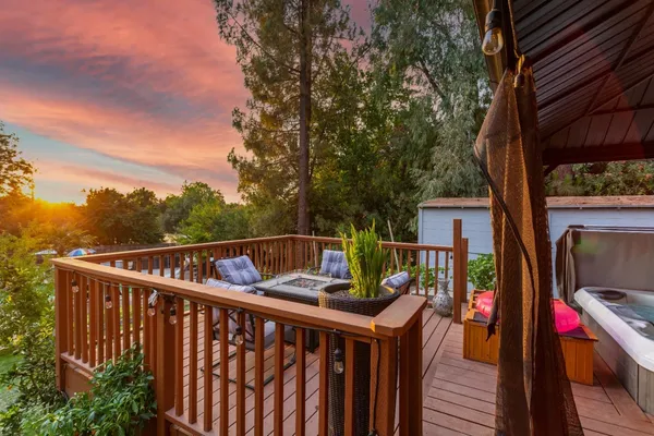 a house with a yard and a large parking space