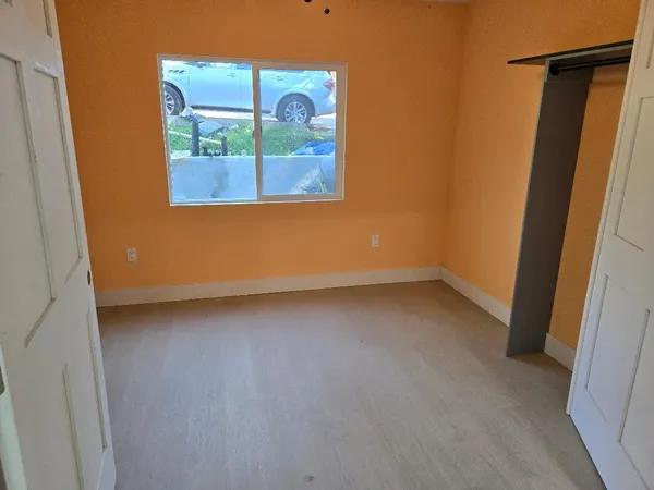 an outdoor space with patio and outdoor seating