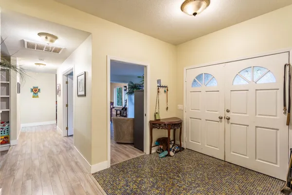 a stove top oven sitting inside of a kitchen