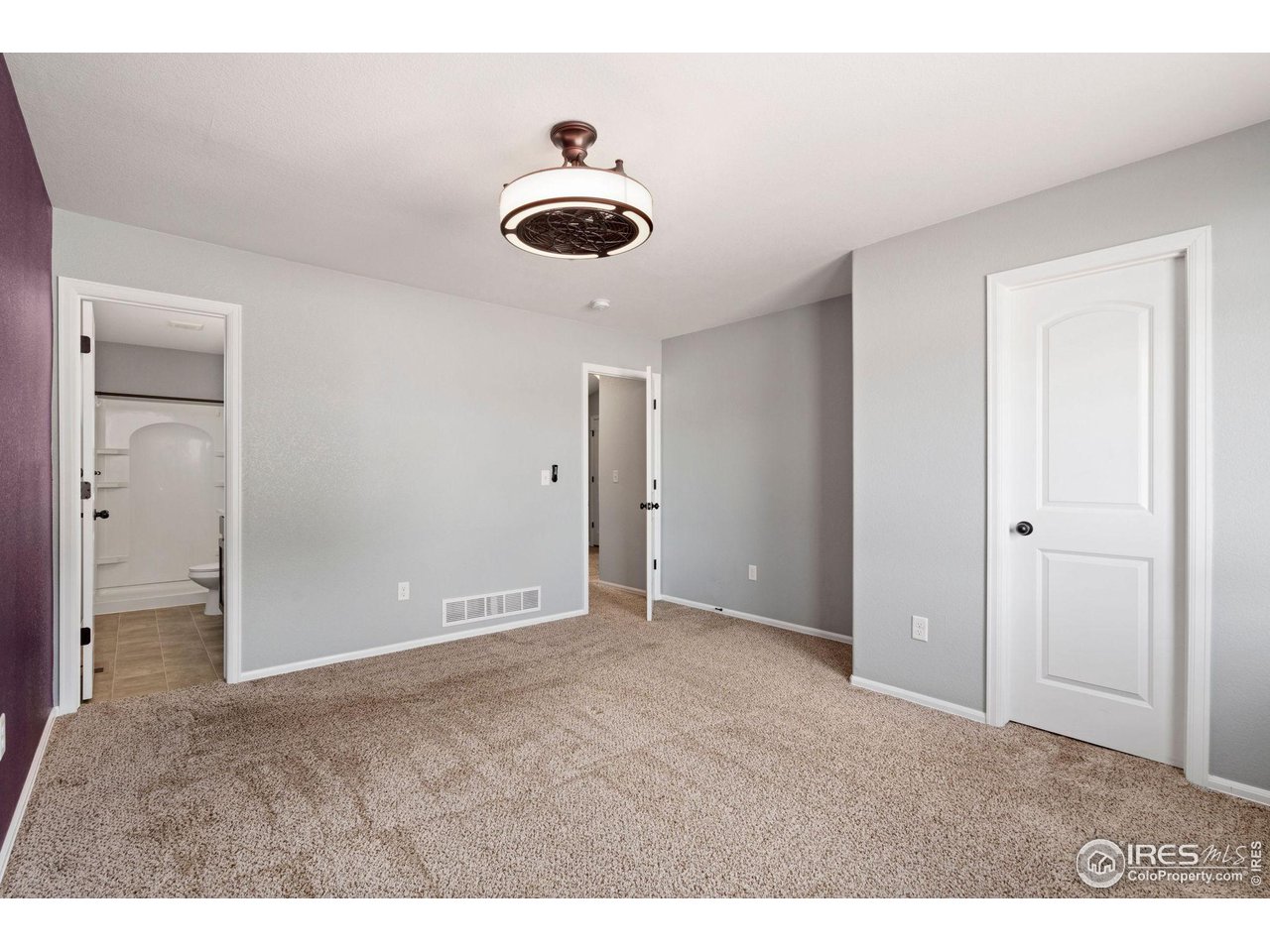 856 Sunlight Peak Drive Severance, CO 80550 - Photo 21 of 40 a view of an empty room and window