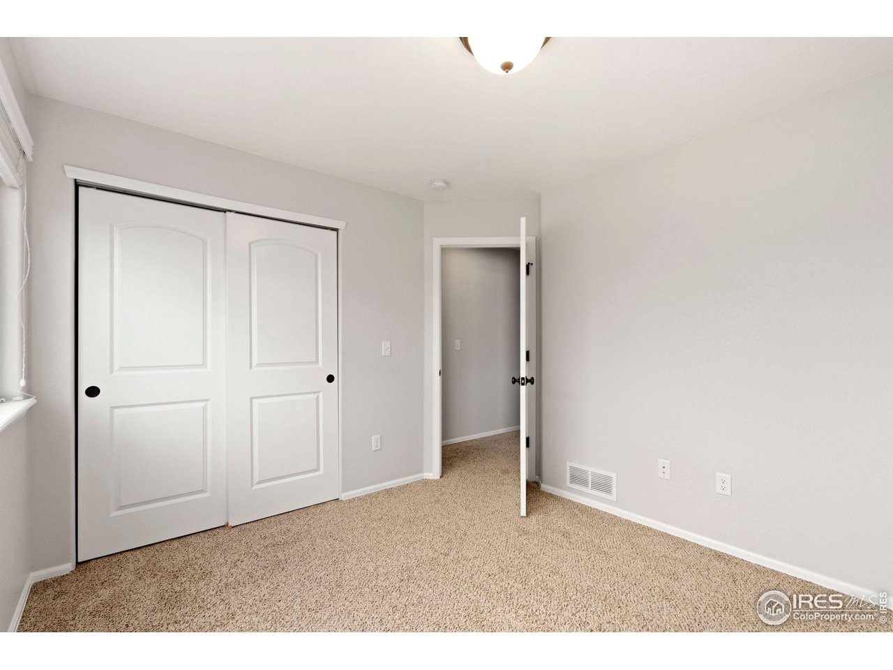 856 Sunlight Peak Drive Severance, CO 80550 - Photo 28 of 40 a view of an empty room